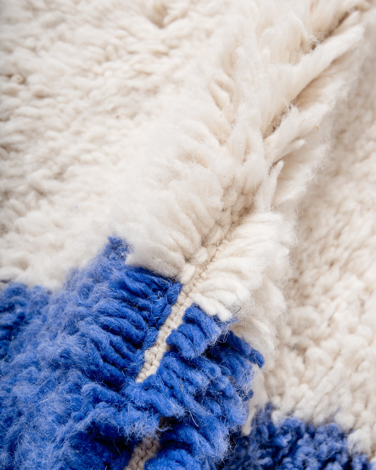 Modern, designer, handcrafted Berber rug from Morocco. Beniourain carpet with beautiful colours and patterns and fluffy wool texture.